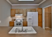 Thumbnail 1 of 30 - Kitchen at Willow Crossings Apartments in Terre Haute
