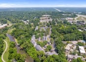 Thumbnail 28 of 28 - an aerial view of a apartment community and trees