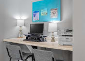 Thumbnail 18 of 28 - business center with a computer and printer