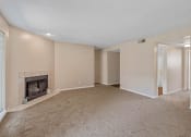 Thumbnail 6 of 28 - living room with a fireplace