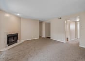 Thumbnail 7 of 28 - living room with a fireplace