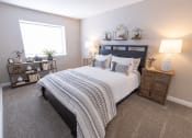 Thumbnail 6 of 17 - a bedroom with a bed and a window