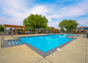 Thumbnail 15 of 17 - the swimming pool at the Westminster apartments and Townhomes