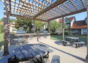 Thumbnail 14 of 28 - Outdoor Kitchen at Woods of Post House Apartments in Jackson, TN