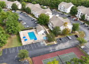 Thumbnail 7 of 14 - view of apartment buildings with off street parking