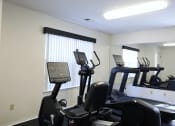Thumbnail 5 of 14 - gym at apartment complex