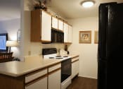 Thumbnail 2 of 14 - kitchen with microwave and appliances