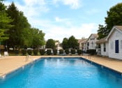 Thumbnail 11 of 14 - swimming pool with apartments in the background