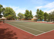 Thumbnail 14 of 14 - private tennis court at apartment community