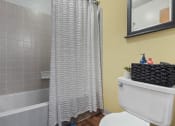 Thumbnail 10 of 22 - apartment bathroom with a shower tub