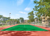 Thumbnail 16 of 22 - tennis court at the apartment community