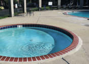 Thumbnail 9 of 16 - apartment complex with hot tub