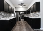 Thumbnail 4 of 16 - Modern Apartment Kitchen
