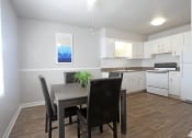Thumbnail 5 of 16 - Dining and Kitchen Area