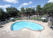 Thumbnail 10 of 16 - outdoor pool at apartment complex