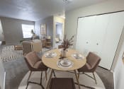 Thumbnail 2 of 21 - a dining area with a table and chairs and a living room in the background