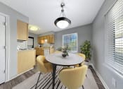 Thumbnail 2 of 11 - a dining room with a table and chairs