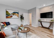 Thumbnail 60 of 93 - Living Room With TV at Copper Creek Apartments, Las Vegas Nevada