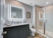 Thumbnail 82 of 93 - Walk-In Showers With Built-In Bench And Glass Enclosure at Copper Creek Apartments, Las Vegas