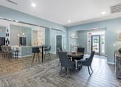 Thumbnail 9 of 29 - a large room with tables and chairs and a glass wall