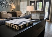 Thumbnail 6 of 21 - a book on a counter in a living room