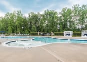 Thumbnail 3 of 32 - the swimming pool at oakdale apartments has a pool and hot tub