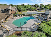Thumbnail 30 of 33 - ariel photo of clubhouse and sparkling swimming pool at Ashley River