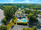 Thumbnail 28 of 29 - a birds eye view of the resort style pool and spa at the crossings apartments