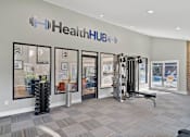 Thumbnail 29 of 33 - modern fitness center with free weights