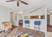 Thumbnail 14 of 33 - bar chairs with eat in kitchen area off living room