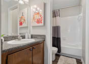 Thumbnail 20 of 33 - spacious bathroom with tub and shower, toilet, and sink