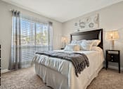 Thumbnail 17 of 33 - spacious bedroom with natural lighting