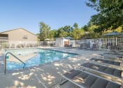 Thumbnail 23 of 35 - our resort style swimming pool is next to our buildings and has lounge chairs