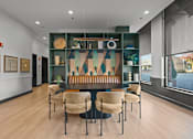 Thumbnail 4 of 17 - A modern dining room with a long table and chairs.