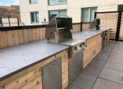 Thumbnail 16 of 33 - New outdoor BBQ area at Lakeview 3200 Apartments, Illinois