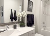 Thumbnail 19 of 19 - Bathroom with sink at Elevate Apartments, Madison, Wisconsin