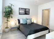 Thumbnail 17 of 19 - Bedroom with bed at Elevate Apartments, Madison, WI
