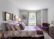 Thumbnail 18 of 30 - Spacious Bedrooms with cozy bed at Versailles on the Lakes Oakbrook*, Illinois