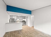 Thumbnail 7 of 36 - Retreat at Indian Lake Hendersonville TN apartments kitchen with white countertops and a blue stripe on the wall.