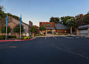 Thumbnail 19 of 37 - Fusion 35 parking lot in front of a building with a sign that says Fusion 35.