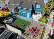Thumbnail 32 of 41 - A red and black object is in the middle of a green area at Fusion Orlando.