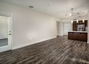 Thumbnail 9 of 24 - Fusion Encore Hollywood Apartments with a wooden floor and a white door.