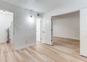 Thumbnail 8 of 43 - Micro apartments in Haltom City, TX for Rent - Fusion Fort Worth Apartments - Renovated Interior with Hardwood Inspired Flooring