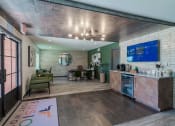 Thumbnail 40 of 43 - fusion fort worth leasing office interior with coffee bar and modern rustic decor