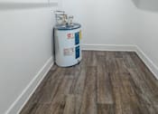 Thumbnail 14 of 38 - A large closet with wood flooring at Mandarin Bay Apartments.