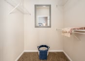 Thumbnail 11 of 21 - Spacious walk-in closet, ideal for extra storage, located in a Catalina Club apartment.