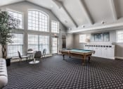 Thumbnail 20 of 29 - a recreation room with a pool table and a bar