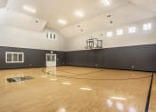 Thumbnail 6 of 28 - Indoor basketball court with windows at The Fort in Indianapolis, IN.