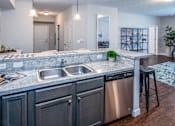 Thumbnail 7 of 55 - Arbors at Turnberry pet friendly apartments and townhomes Pickerington, Ohio large kitchen, wood style flooring, stainless steel appliances, cabinet space, dishwasher