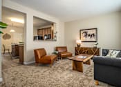 Thumbnail 25 of 55 - Arbors at Turnberry pet friendly apartments and townhomes Pickerington, Ohio spacious living room with carpet flooring and natural light